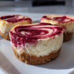 Mini Raspberry Swirl Cheesecakes